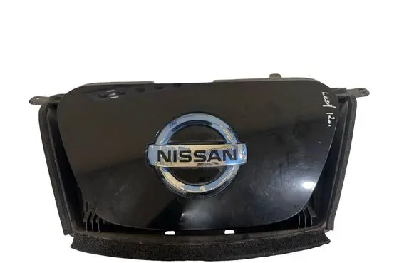 Nissan Leaf I (ZE0) Electric car charge socket cover 657303NA4A