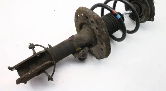 Nissan Leaf I (ZE0) Front shock absorber/damper