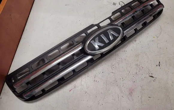 KIA Sportage Front bumper upper radiator grill 863501F030