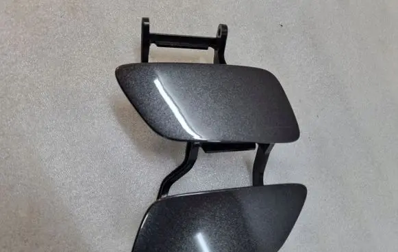 Headlight washer spray nozzle cap/cover