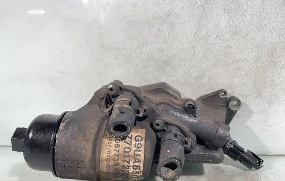 Opel Movano A Oil filter mounting bracket 7701722798 G9UA650 C067736