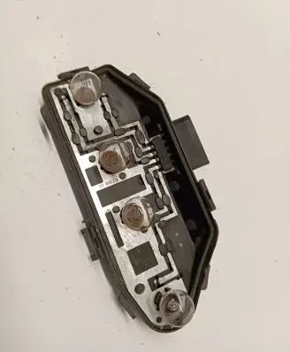 Tail light bulb cover holder