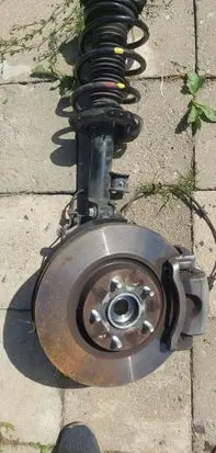 Hyundai Tucson TL Front shock absorber with coil spring 54660F1530