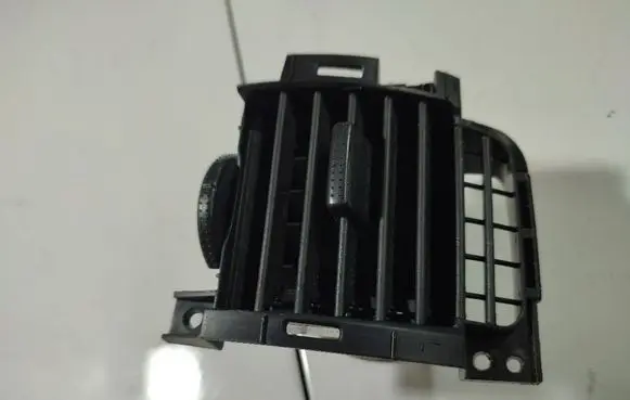 Dash center air vent grill