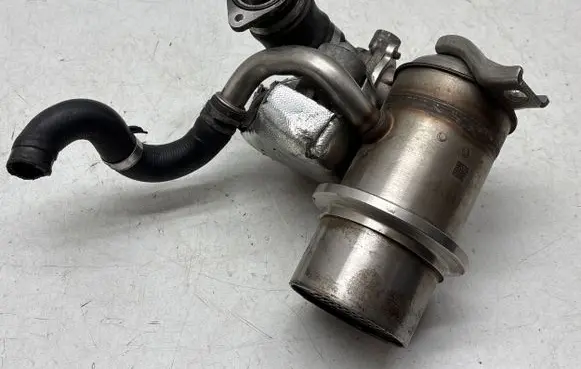 Volkswagen Caddy EGR valve cooler FW000003 508159 04L131512AJ