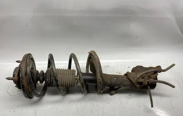 Mitsubishi Lancer X Front shock absorber with coil spring