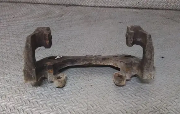 Toyota Yaris Front Brake Caliper Pad/Carrier 