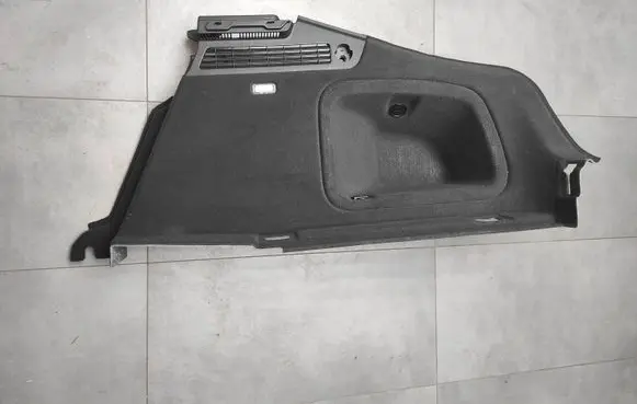Trunk/boot lower side trim panel