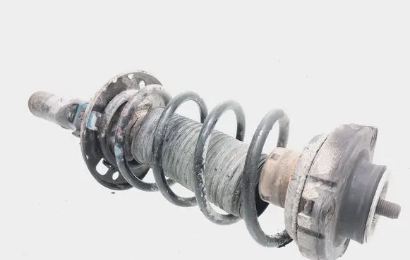 Volkswagen Polo Front shock absorber with coil spring