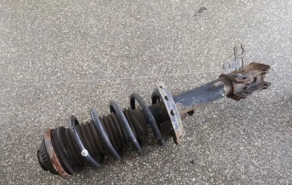 Opel Astra H Front shock absorber with coil spring 22214013 24466547