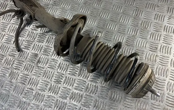 Opel Corsa D Front shock absorber with coil spring