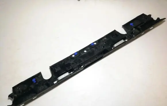 Trunk door license plate light bar