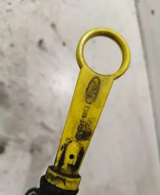 Oil level dip stick
