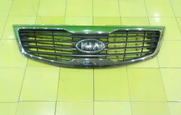 KIA Sportage Front bumper upper radiator grill 863523W000
