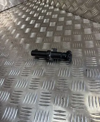 Headlight washer spray nozzle
