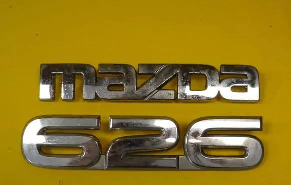 Mazda 626 Manufacturer badge logo/emblem GF4A51720 G14S51711