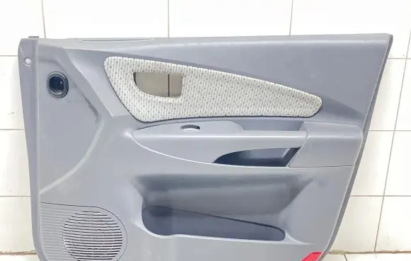 Hyundai Tucson JM Front door card panel trim 823202E000