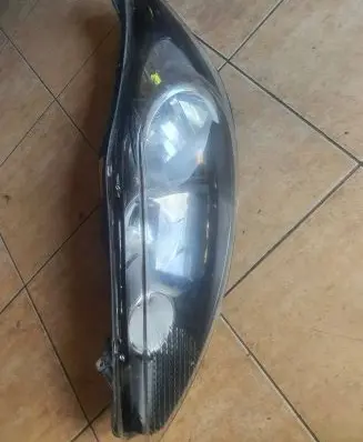 Ford Fiesta Headlight/headlamp 8A6113W030AJ 1EJ24704501