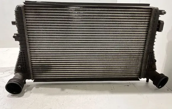 Volkswagen Golf V Intercooler radiator 1K0145803L