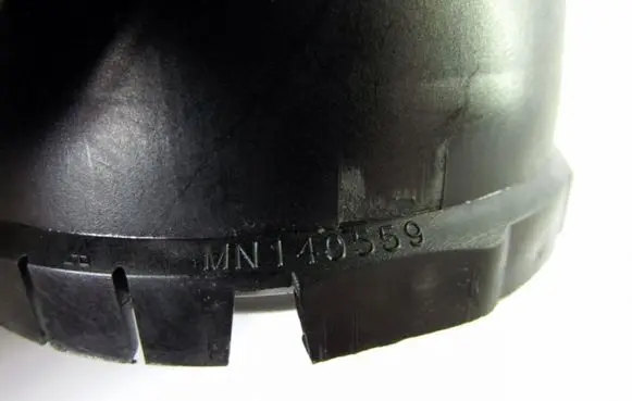 Mitsubishi Colt Dash center air vent grill MN140559