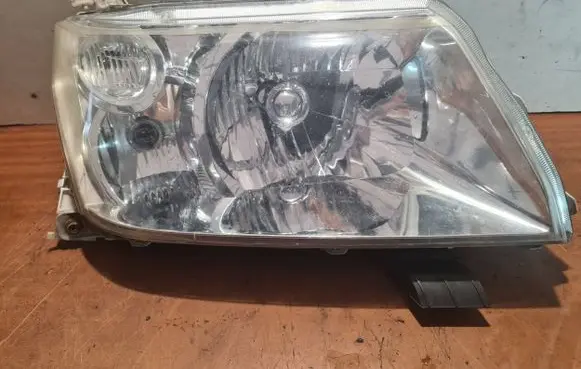 Suzuki Grand Vitara II Headlight/headlamp 10059076