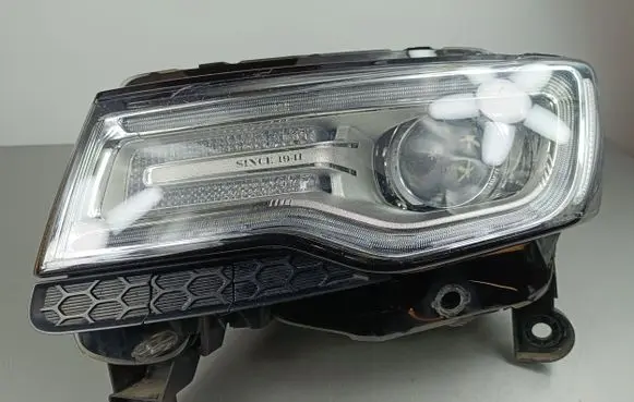 Jeep Grand Cherokee Headlight/headlamp 6814705AG