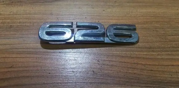 Mazda 626 Manufacturer badge logo/emblem 