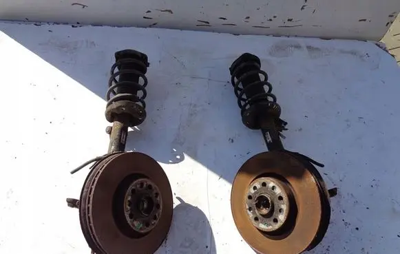 Volkswagen Eos Front shock absorber with coil spring