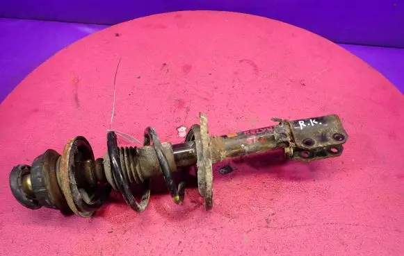Dacia Sandero Front shock absorber with coil spring
