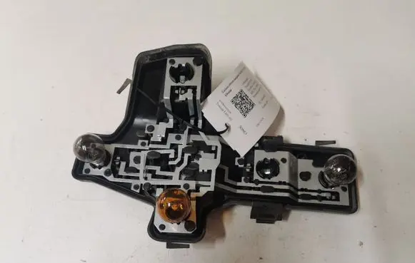 Tail light bulb cover holder
