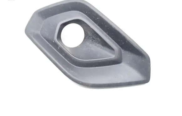 Ford Courier Front fog light trim/grill JT7619952BAW