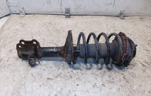 Front shock absorber with coil spring