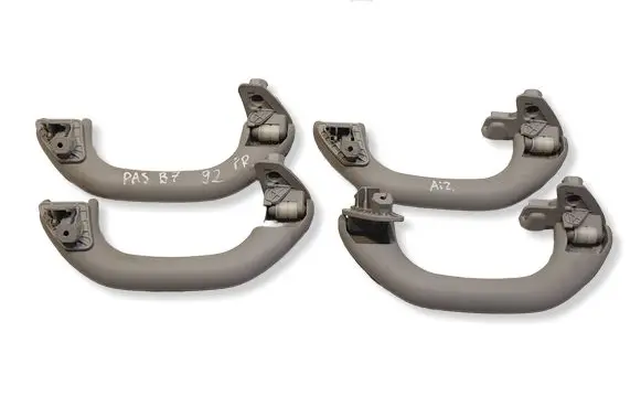 Volkswagen PASSAT B7 A set of handles for the ceiling 1K0857607N