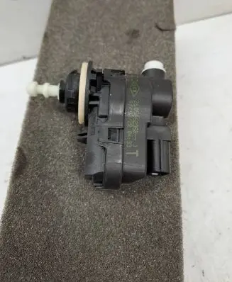 Dacia Sandero III Headlight level adjustment motor 260566235R