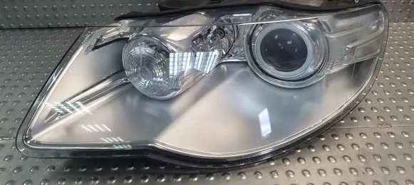 Volkswagen Touareg I Headlight/headlamp 7L6941031C