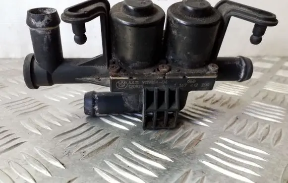 Coolant heater control valve
