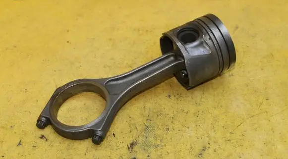 Piston with connecting rod