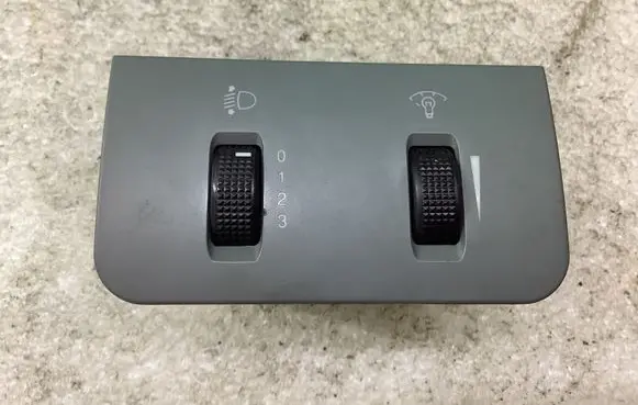 Headlight level height control switch