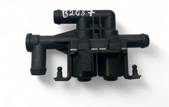 Coolant heater control valve