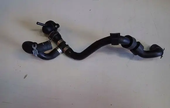 Volkswagen Golf VII Engine coolant pipe/hose 04L121131AA