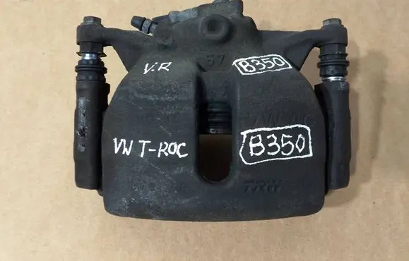Volkswagen Golf VII Front brake caliper 6792G