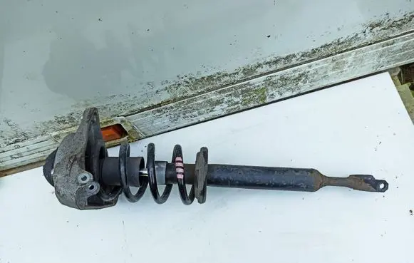 Audi A6 S6 C6 4F Front shock absorber with coil spring