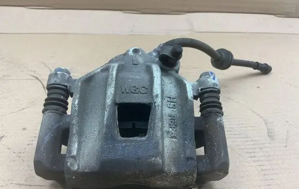 Dacia Spring Front brake caliper