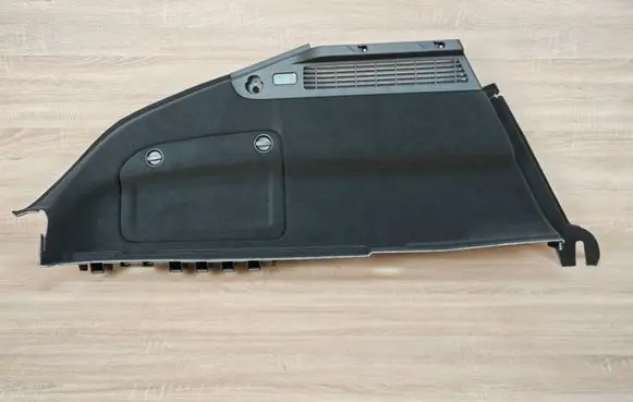 Trunk/boot lower side trim panel