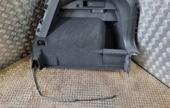 Trunk/boot lower side trim panel