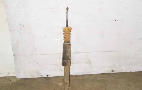 Volkswagen Touran I Rear shock absorber/damper 1T0512011AK