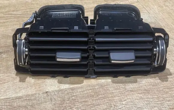 Jaguar XE Rear air vent grill GJ32014A22AA GX63014A22AB