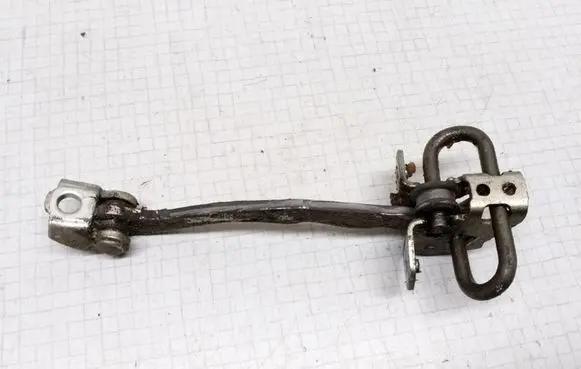 Opel Astra G Front door check strap stopper 90520759