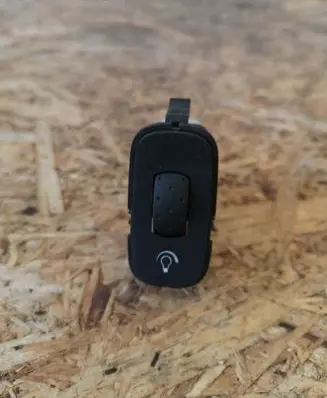 Panel lighting control switch