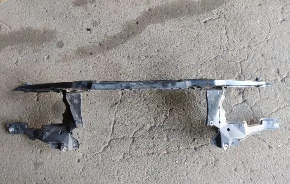 Radiator support slam panel